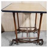 (DL) Vintage rolling cart on casters. Table top