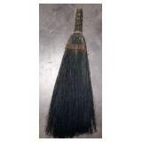(AB) Primitive blue thistle whisk broom.