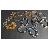 Bracelets. Beaded, gold & silver costume.