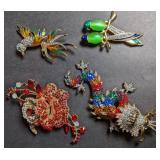 Costume brooches, gold in tone. Dragon, rose,