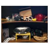 Lot of contents of shelves including ashtrays,