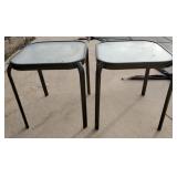 Two Metal and frosted glass patio side tables,