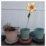 Lot of assorted plastic pots with rolling carts,