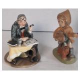 Pair of painted porcelain figurines smoking man