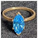 Gold ring w/ blue marquise cut stone marked