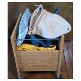 Rolling cart of purses w/ various purses