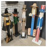 Five seasonal wood post character decorations,