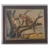 Framed oil on stretched canvas leopard signed R.