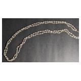 Pearl necklace w/ gold accent beads. Clasp marked