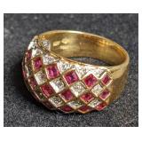 Gold domed ring w/ pink accent stones  marked