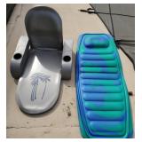 Two foam floating pool loungers, one flat, one