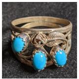 Silver ring w/ turquoise color stone & flower