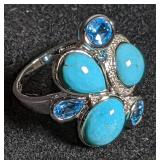 Silver ring w/ blue accents marked "925". Total