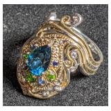 Silver ring w/ gold-tone accents & blue stone