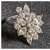 Silver ring w/ stone cluster marked "sterling".