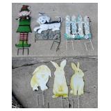 Six assorted metal decorative oudoor stakes,