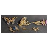 Gold tone costume brooches. Butterfly, bird,