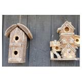 Pair of naturalistic wooden birdhouses, 12" to