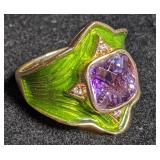 Gold ring w/ green accents & purple stone marked
