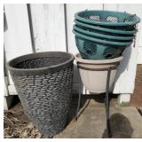 Lot of assorted outdoor plastic pots with metal