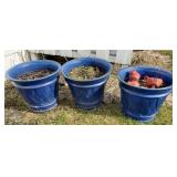 Three Grosfillex blue outdoor pots with three