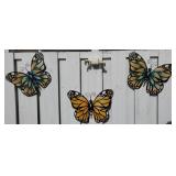 Three metal wall hanging butterfly decorations,