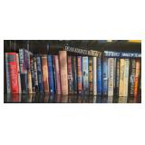 Contents of shelf w/ various books inc/ several