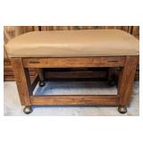 Rolling wooden bench on wheels w/ vinyl cushion