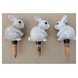 Three rabbit terra cotta auto watering spikes,