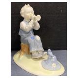 (X) Kunstporzella llmenau "Boy Playing Flute"