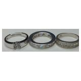 (XX) Lot of three Sterling silver rings with white