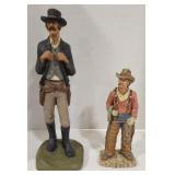 (AM)  2 Cowboy statues. Cowboy w/black hat is
