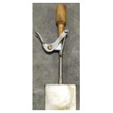 (AM) Antique ice cream sandwich maker.