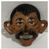 (AM)Vintage Four Eyed Man Cast Iron Bottle