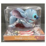 (TU) Animated Stitch in packaging approx 7" tall.
