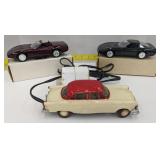 (Hi) 3 toy cars, 2 Corvettes and one ford