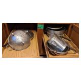 Contents of Cabinet Including Pot, Pan, Strainer,