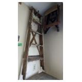 Contents of wall corner. ladder, benches.