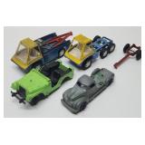 Vintage Hubley Trucks & More. Largest measures 8"