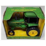 1/16 Ertl John Deere 4450 Tractor With Cab.