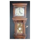(A) P.F. Bollenbach Wall Clock With Key