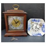 (A) Howard Miller Mantle Clock With Key.  Delft