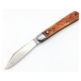 Schrade Cut Co. Press Button Jigged Bone Switchbla