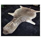 Zebra Taxidermy Rug with Piping and Black Carpet B