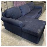 (L) 2 Piece Blue Sectional Couch. 105" x 62" x 41"