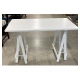 (L) White Trestle Table. 46" x 30" x 24"