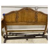 (H) Wooden bed frame with metal rails. Missing