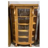 (Q) Display cabinet with curved class. Stands