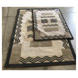 (D) Lot of 2 Rugs Measuring aprox 66" by 43" and