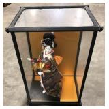 (Q) Ornate geisha doll in glass case